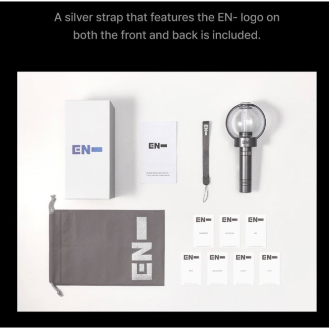 A product layout showing a silver EN-strap accessory set with a clear round end, a white box, a small card, a gray drawstring bag with large EN branding, several small white cards, and a strap tool, all arranged on a white background with text above describing the included silver strap with EN logo on both front and back.